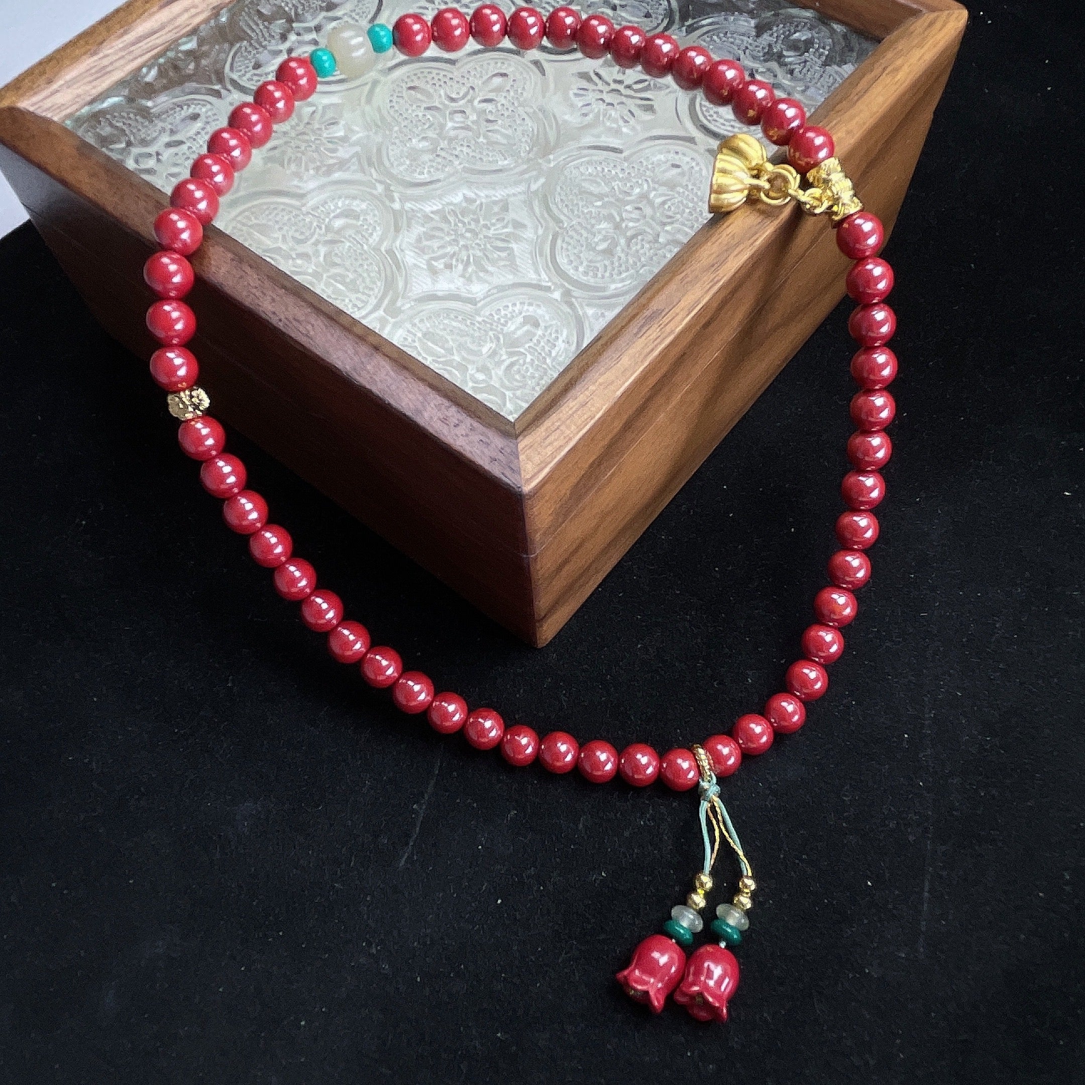 cinnabar design bead string