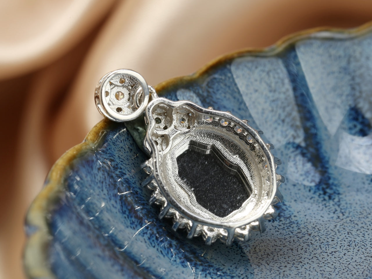 crystal and jadeite pendant