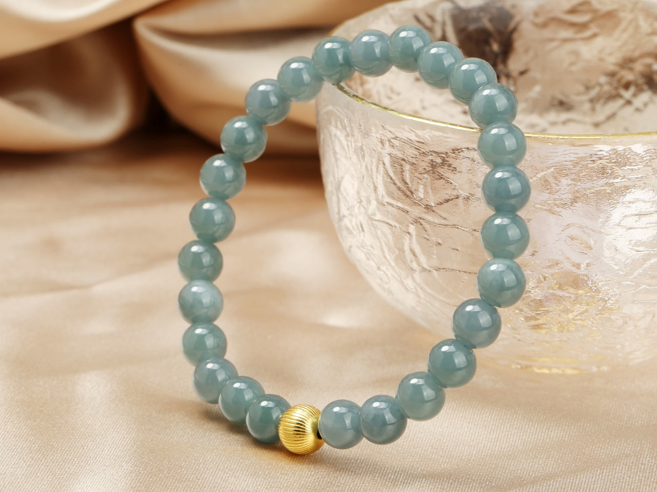 blue water round bead jadeite bracelet.