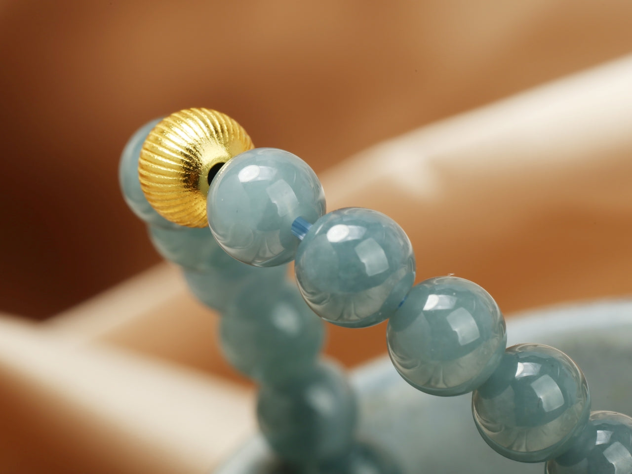 blue water round bead jadeite bracelet.