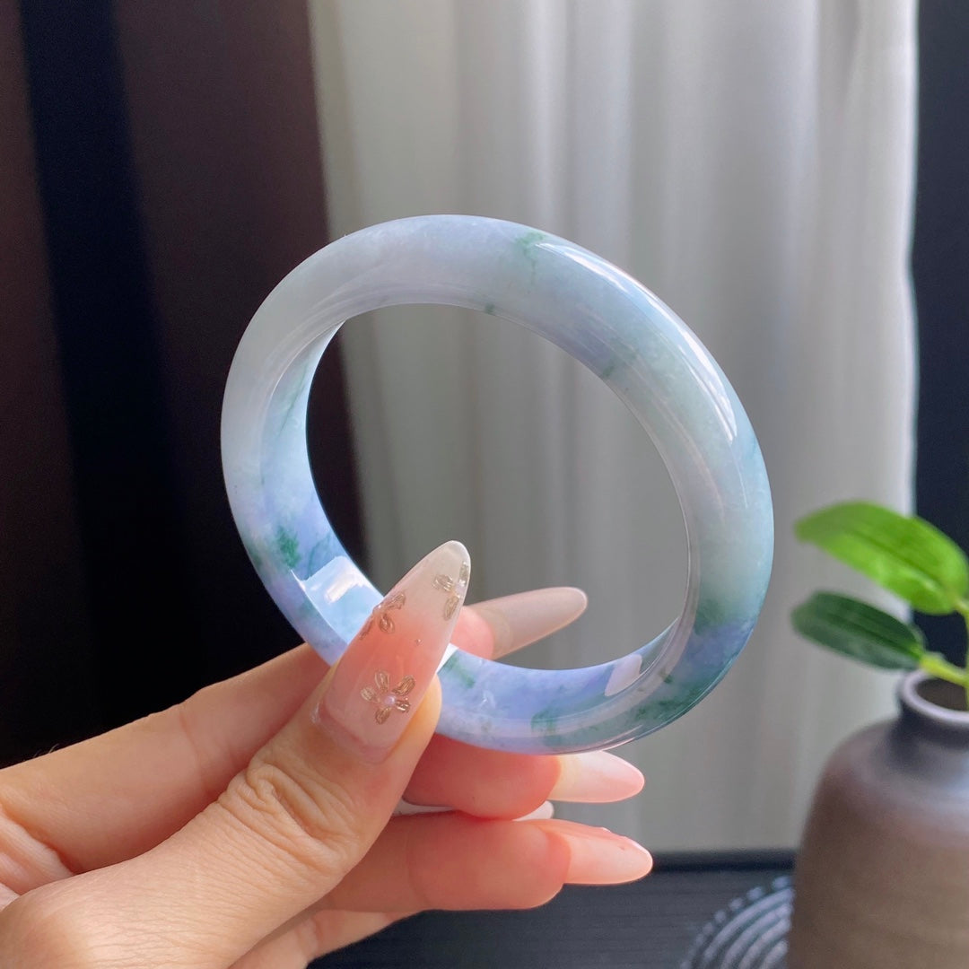 Distinctive Purple Jadeite Bangle with Drifting Patterns