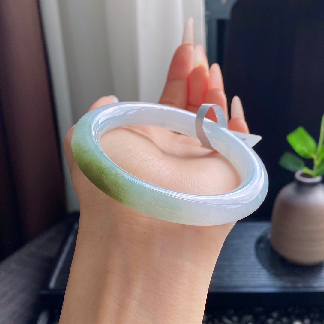 A Touch of Olive-Green Jadeite Bangle