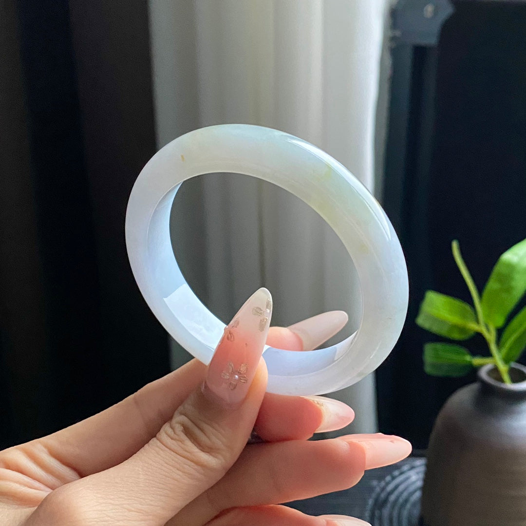 Jadeite Bangle with Drifting Green and Gold Spots