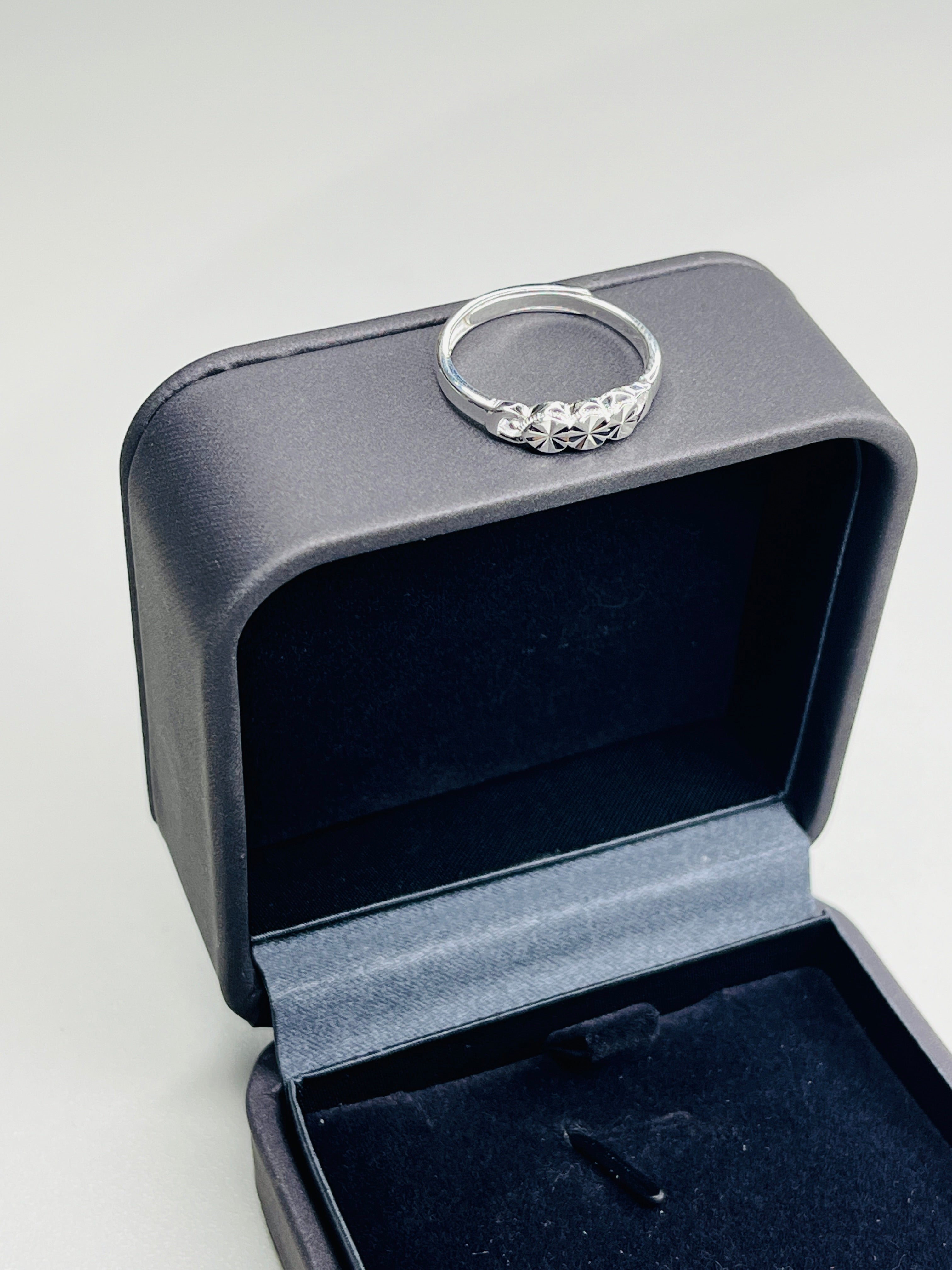 Silver Adjustable Ring with Three Floral Hearts