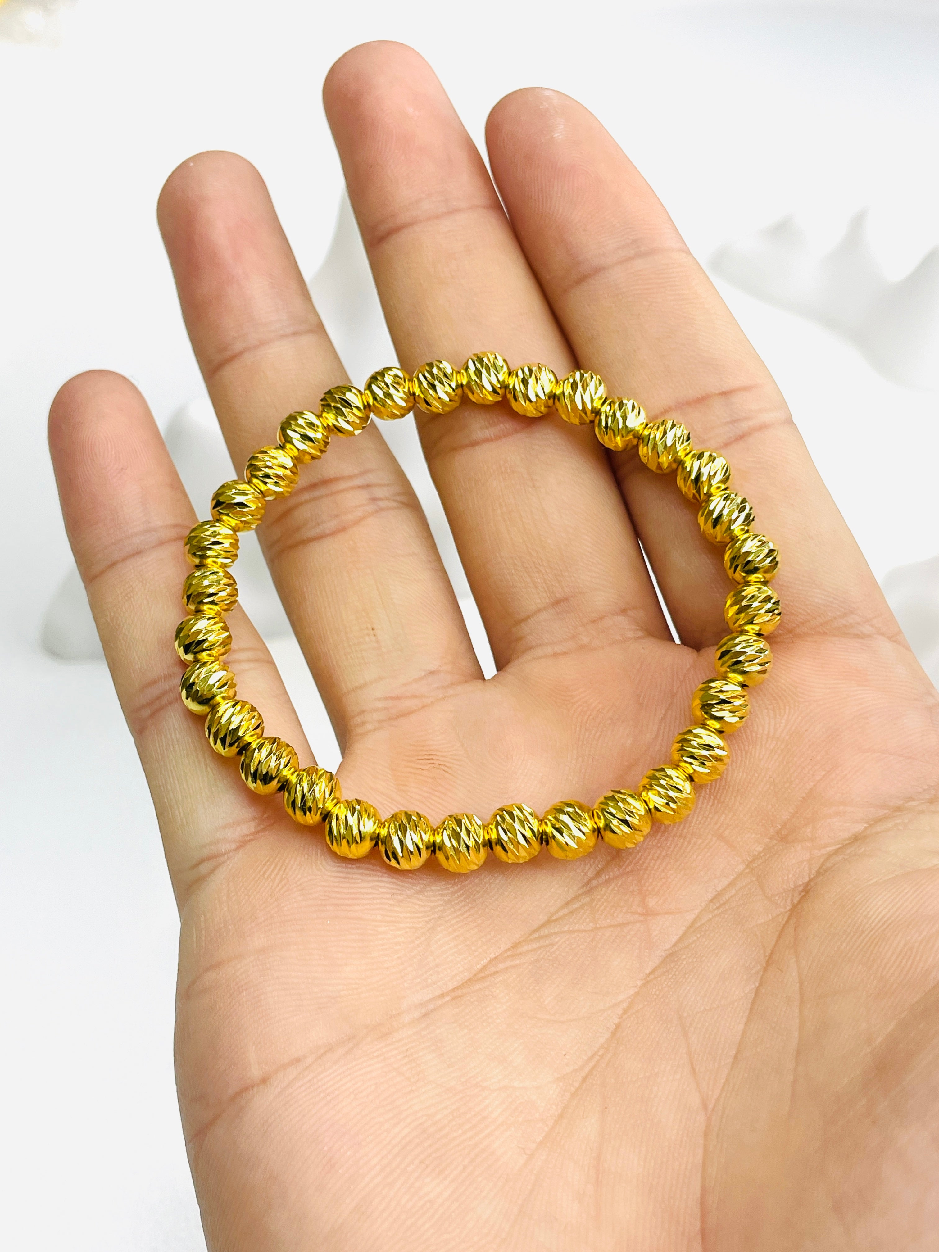 Gold Oblique-Cut Bead Bracelet