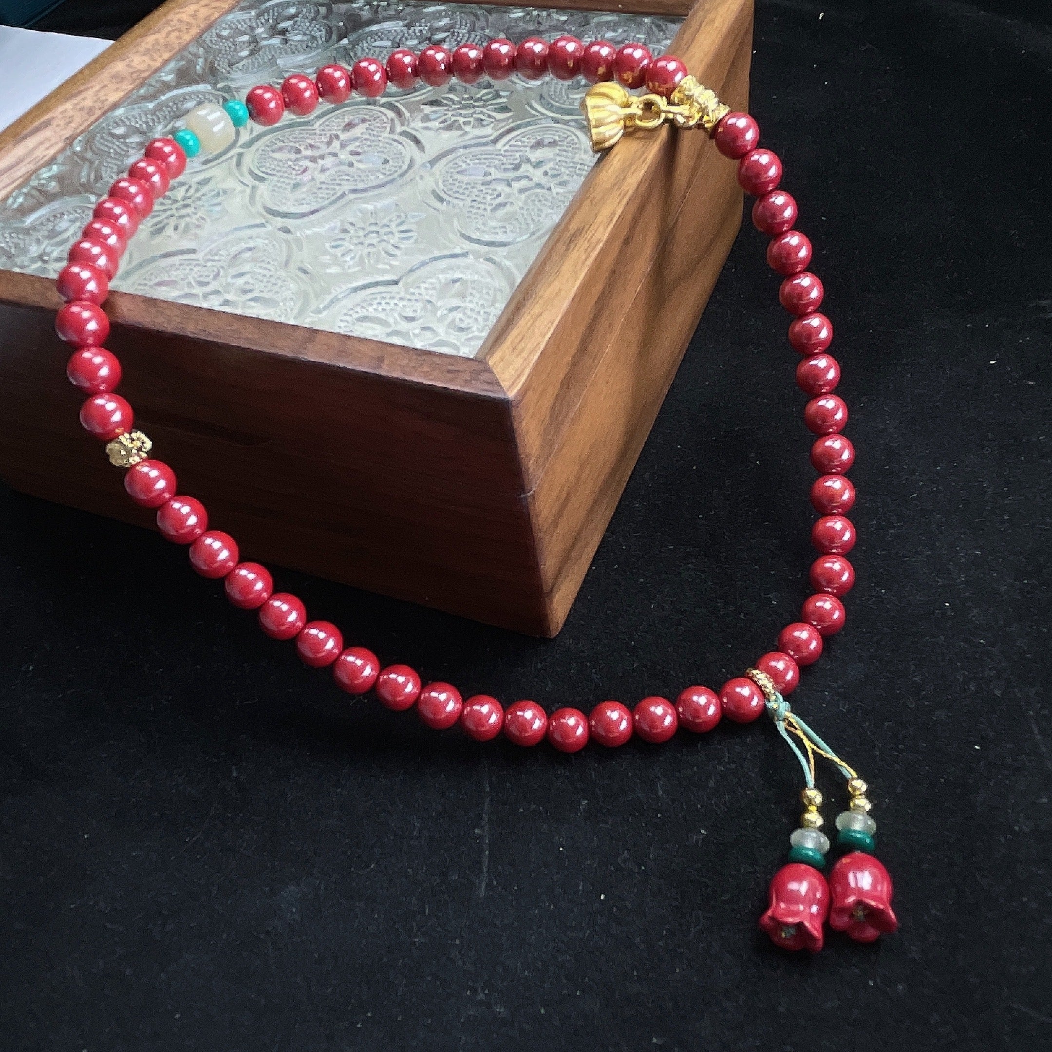 cinnabar design bead string