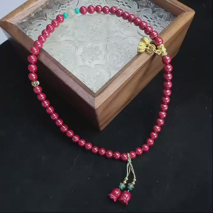 cinnabar design bead string